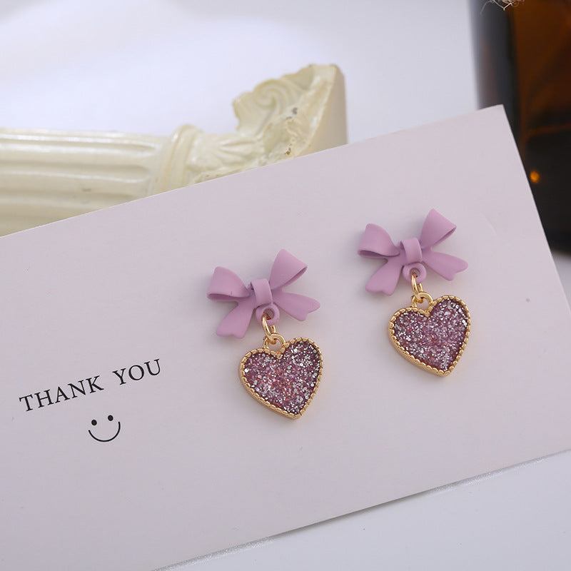 Purple Bow Sequin Love Heart Clip On Earrings