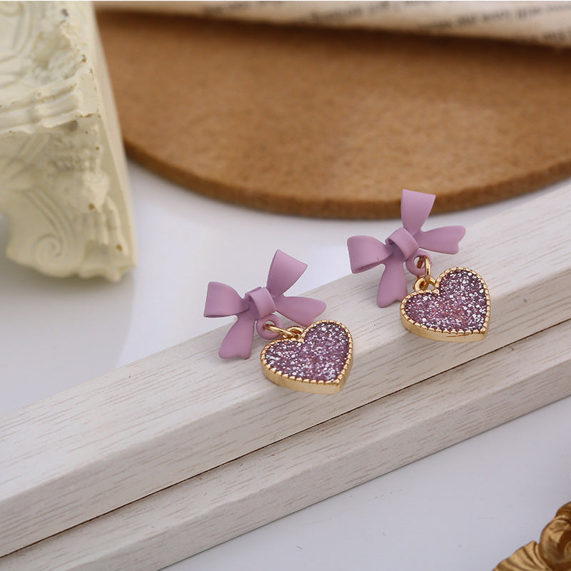 Purple Bow Sequin Love Heart Clip On Earrings