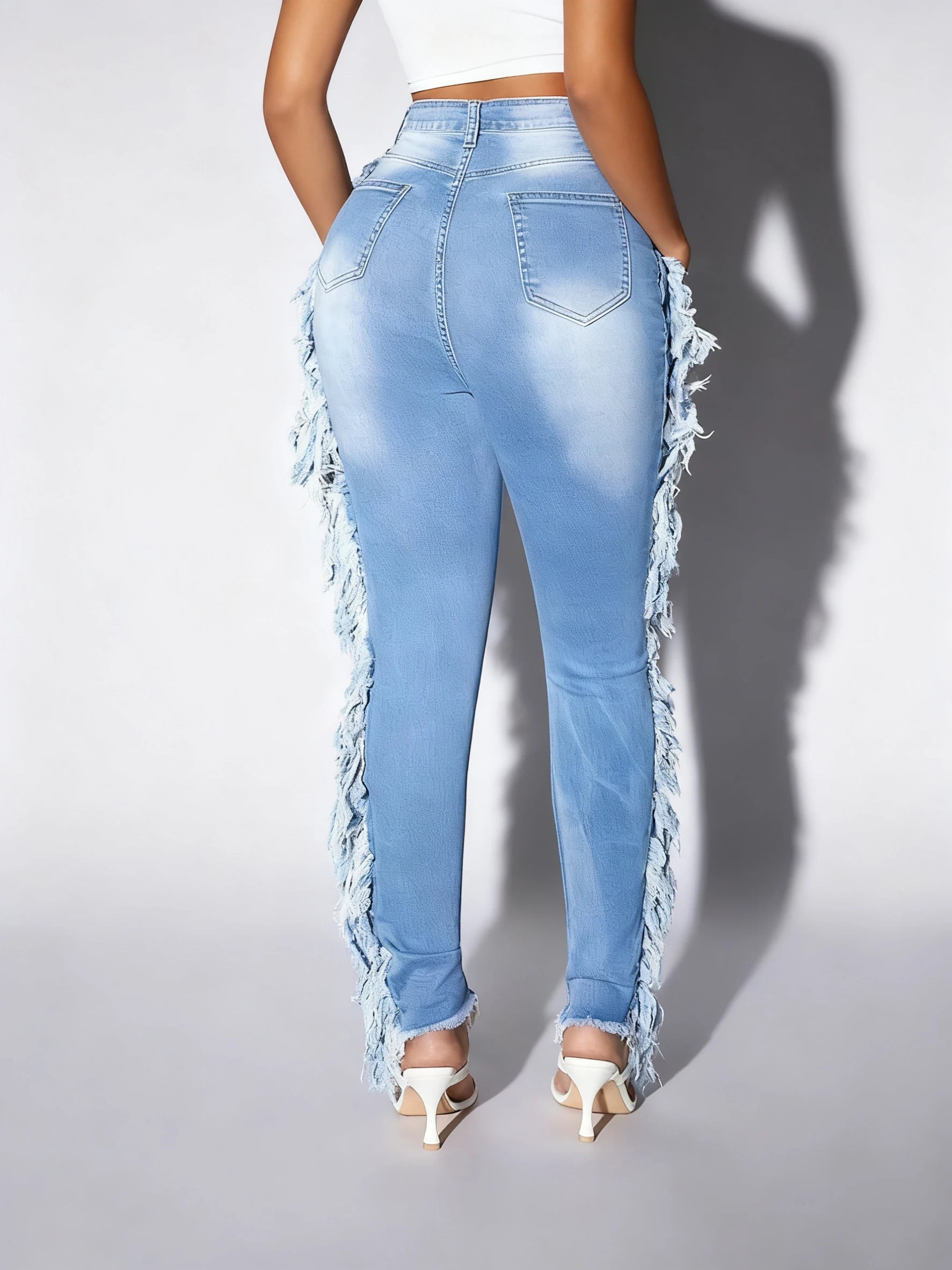 Ladies' light blue skinny jeans; slim-fit, mid-rise, stretchable, fashionable, denim ankle pants.