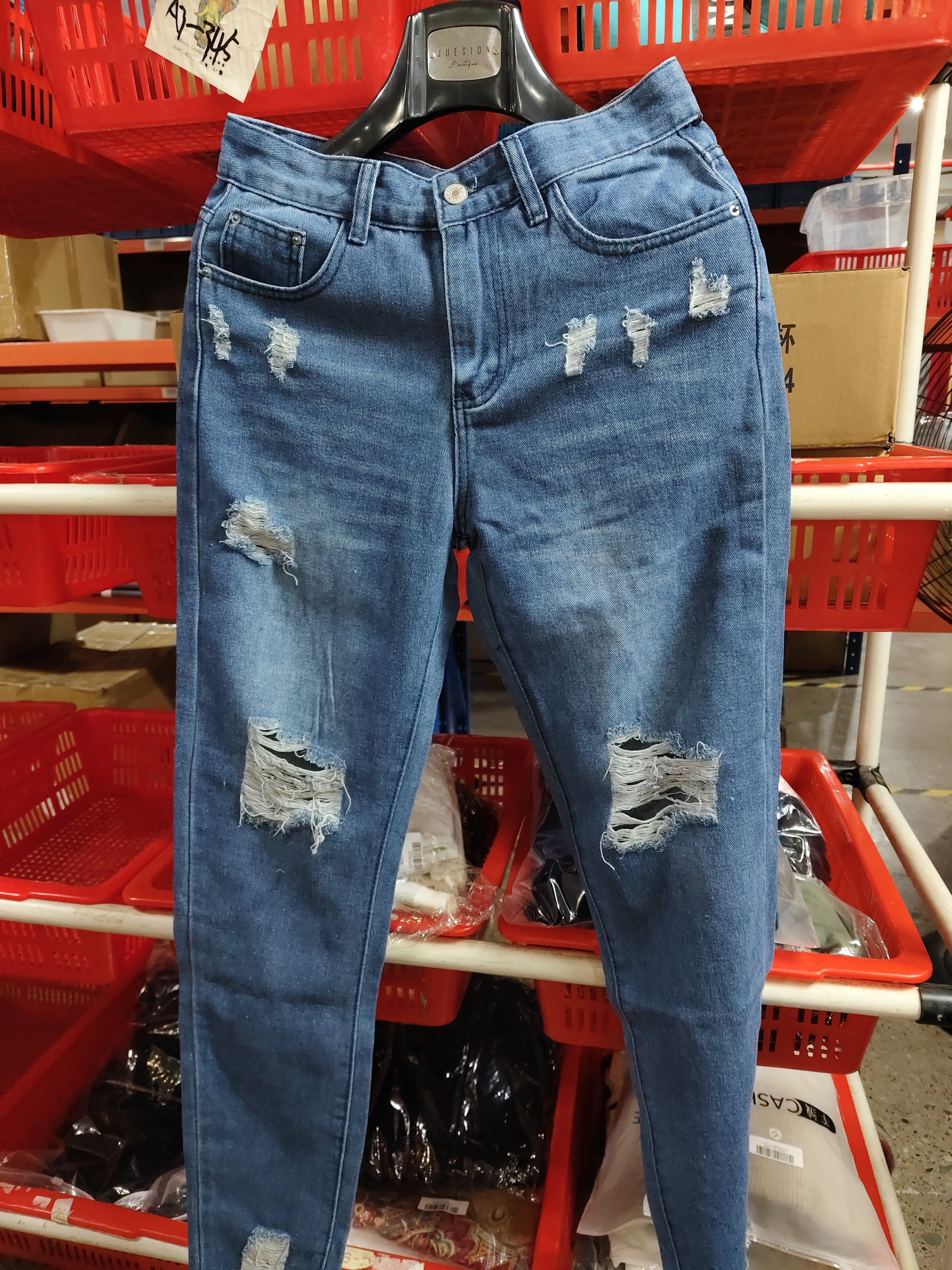 Ripped Denim Trousers Washed And Worn